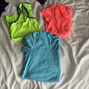 THREE REEBOK WORKOUT SHIRTS